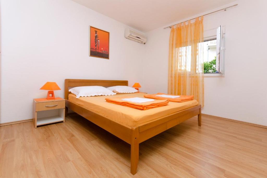 Postel nebo postele na pokoji v ubytování City Apartments Nada