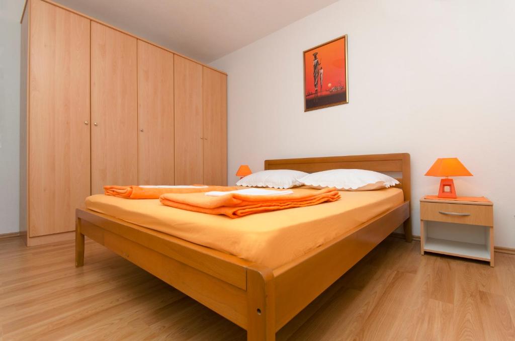 Postel nebo postele na pokoji v ubytování City Apartments Nada