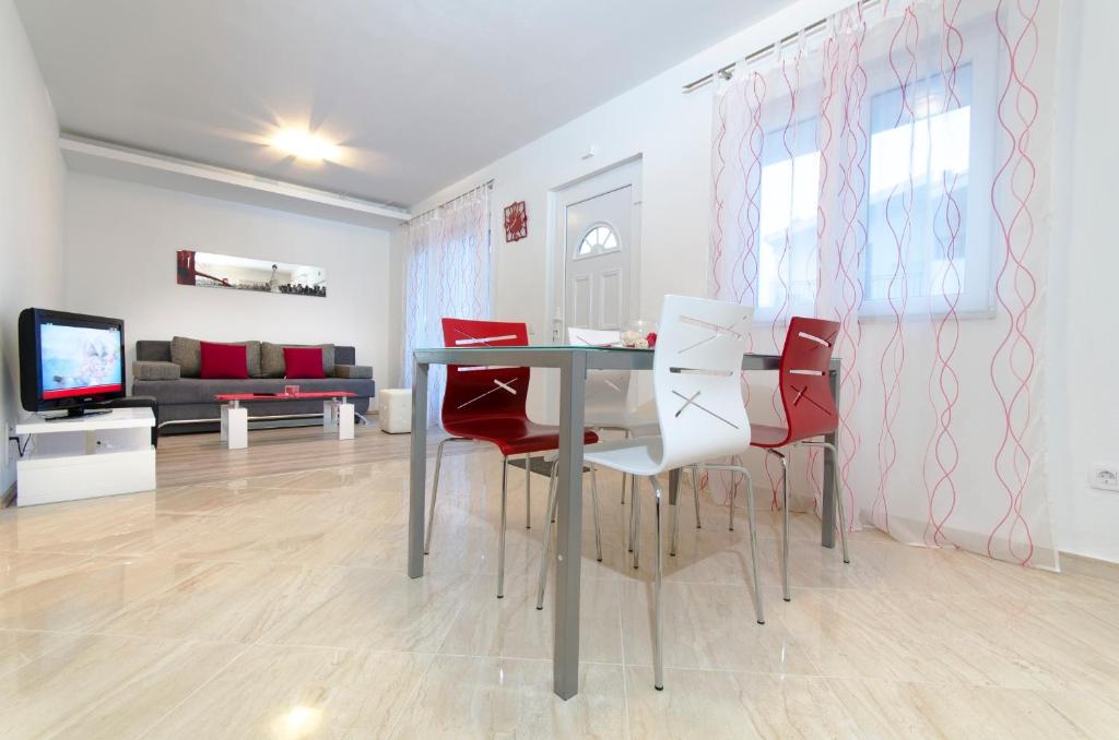 TV a/nebo společenská místnost v ubytování City Apartments Nada