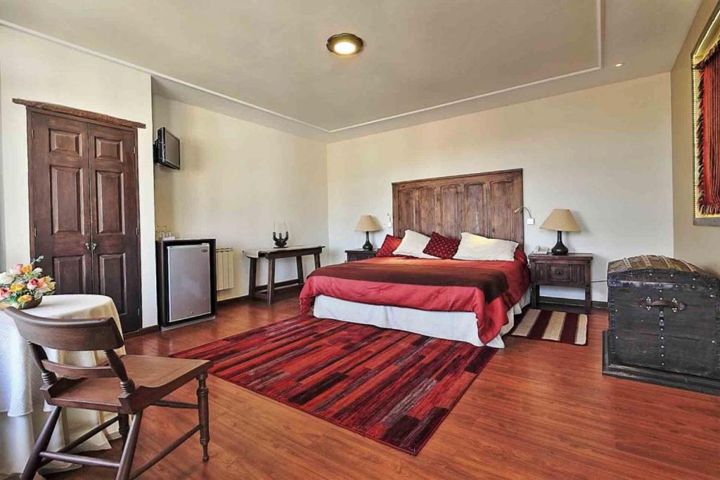 Ein Bett oder Betten in einem Zimmer der Unterkunft Mi Pueblo Samary Hotel Boutique