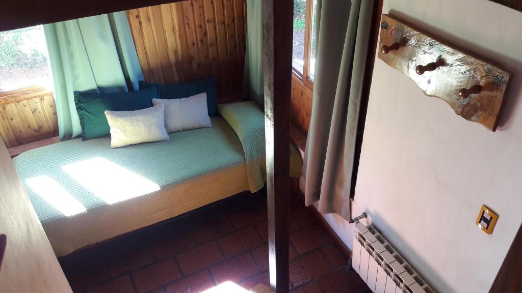 Postel nebo postele na pokoji v ubytování El Aguila