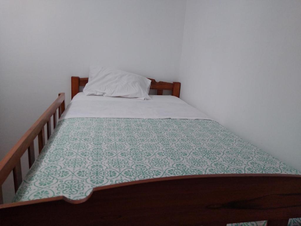 Postel nebo postele na pokoji v ubytování BACHÍG Hospedaje