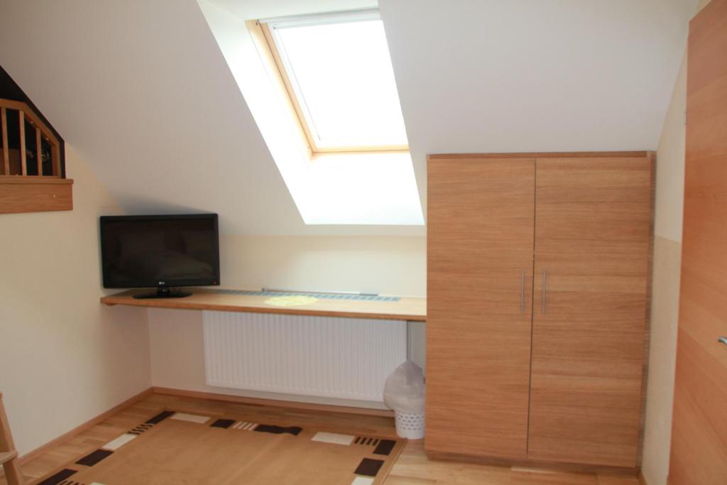 A television and/or entertainment centre at Haus Sylvia