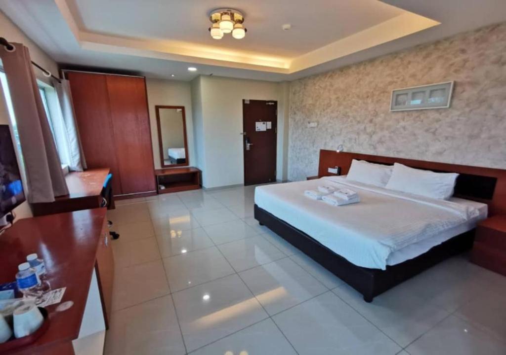 Postel nebo postele na pokoji v ubytování Yew Boutique Hotel