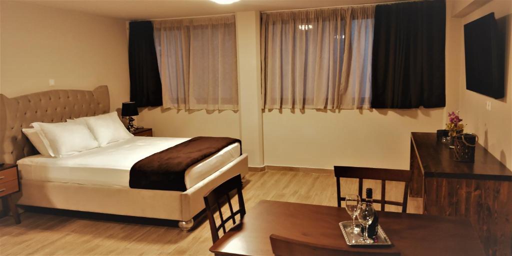 Postel nebo postele na pokoji v ubytování Pallada Athens boutique rooms & apartments