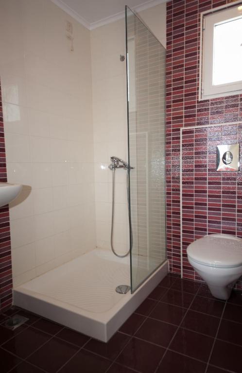A bathroom at Cosmos Apartments