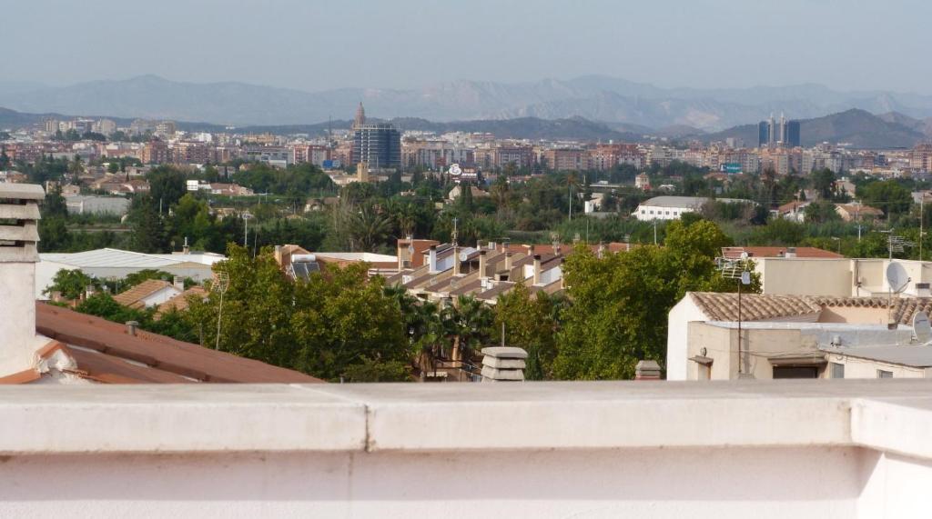 a view of a city from the roof of a building at Apartamento Murcia a tus pies in La Alberca