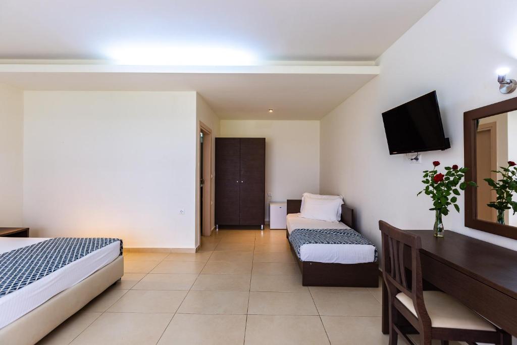 Postel nebo postele na pokoji v ubytování Atali Grand Resort