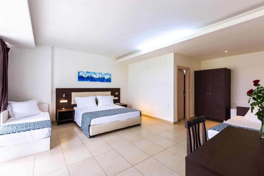 Postel nebo postele na pokoji v ubytování Atali Grand Resort