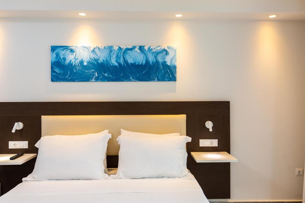 Postel nebo postele na pokoji v ubytování Atali Grand Resort