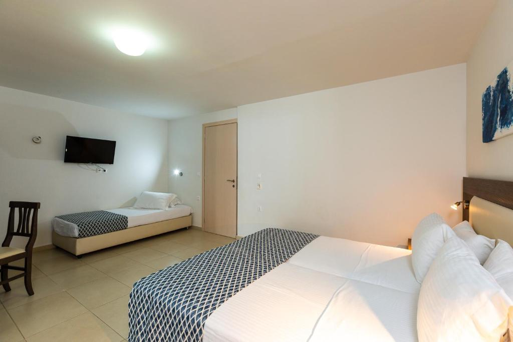 Postel nebo postele na pokoji v ubytování Atali Grand Resort