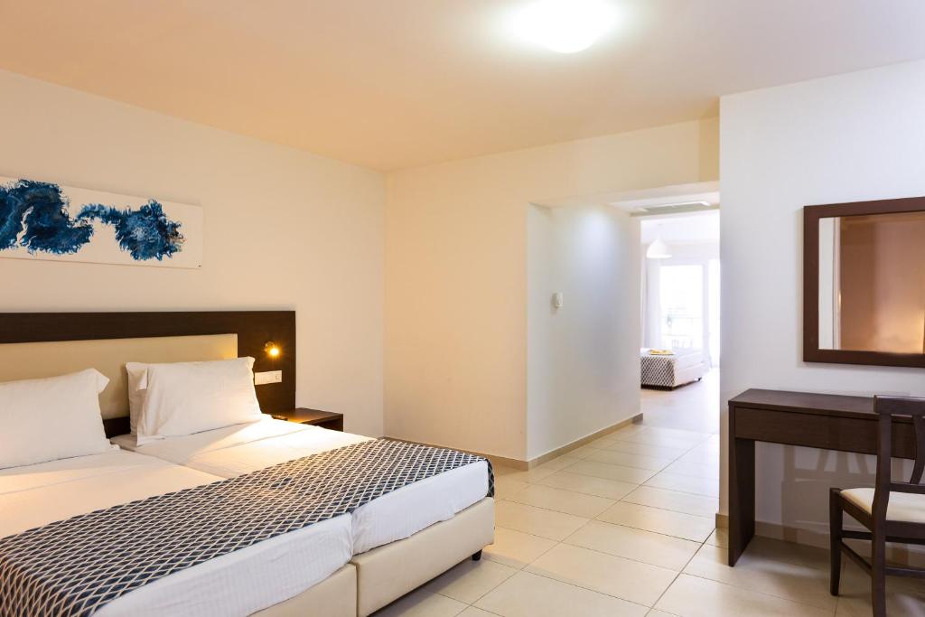 Postel nebo postele na pokoji v ubytování Atali Grand Resort