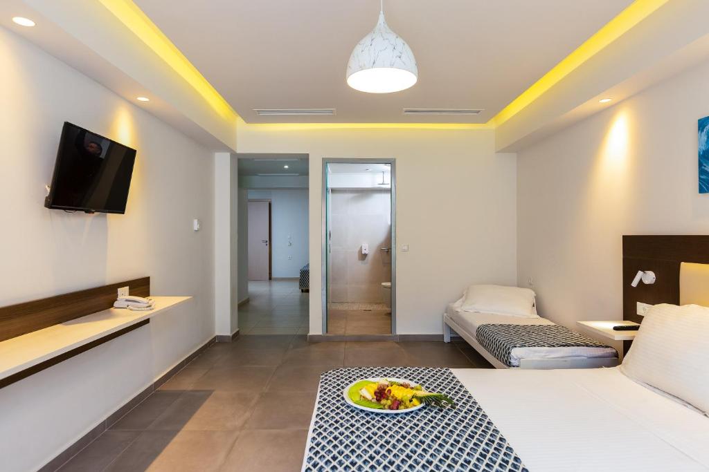 TV a/nebo společenská místnost v ubytování Atali Grand Resort