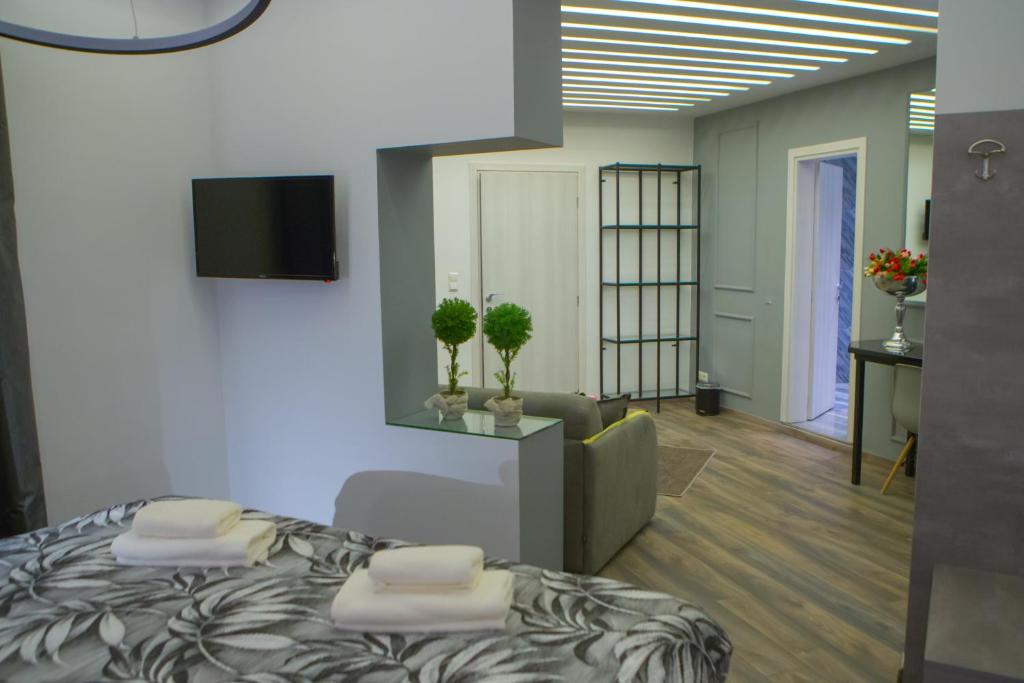 TV a/nebo společenská místnost v ubytování Pantelidis Hotel & Spa