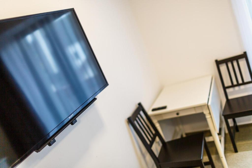 TV a/nebo společenská místnost v ubytování Restaurace a penzion Pod Lipami Metylovice