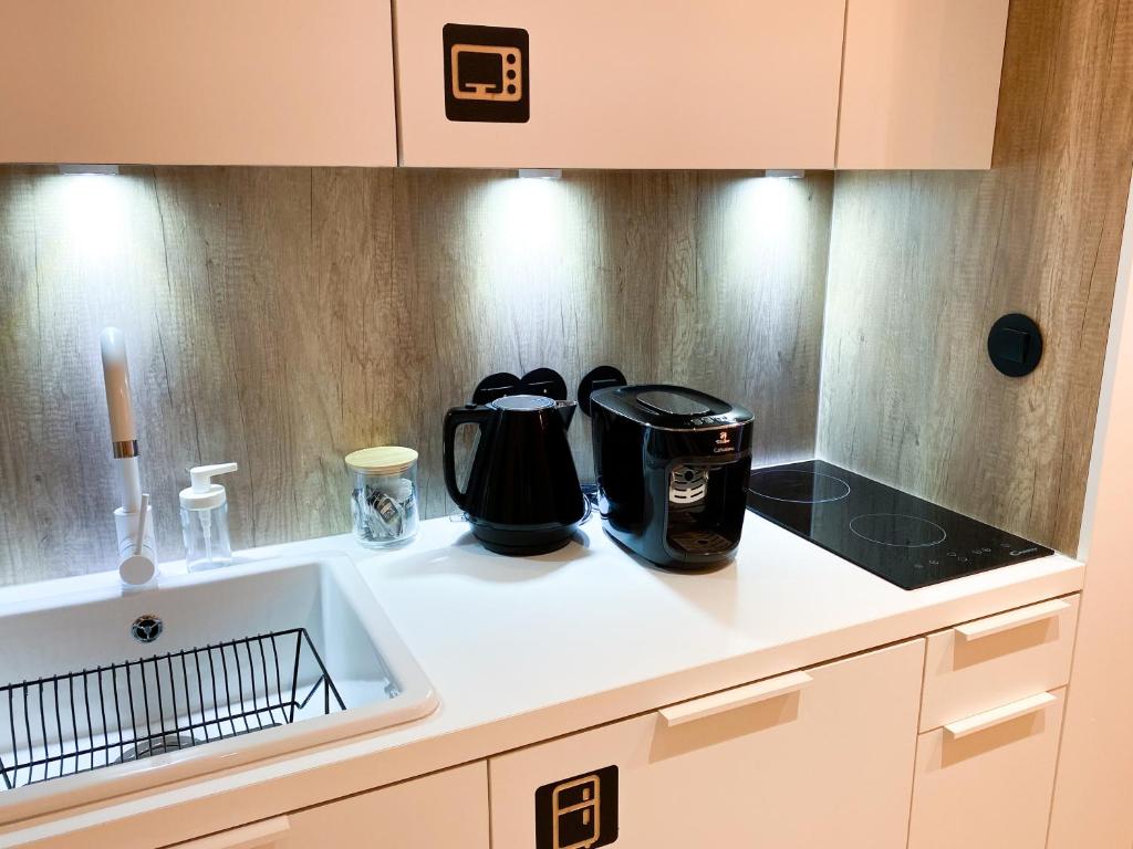 Kuchyňa alebo kuchynka v ubytovaní ONE Apartamenty Gąsiorowskich 4
