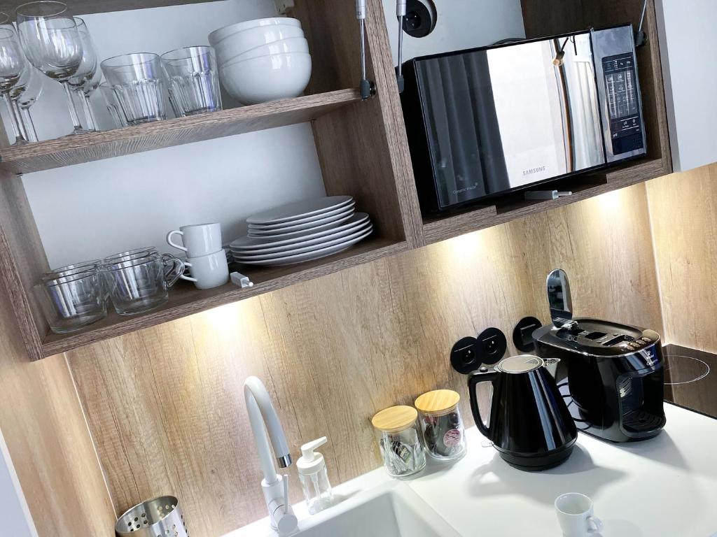 Kuchyňa alebo kuchynka v ubytovaní ONE Apartamenty Gąsiorowskich 4