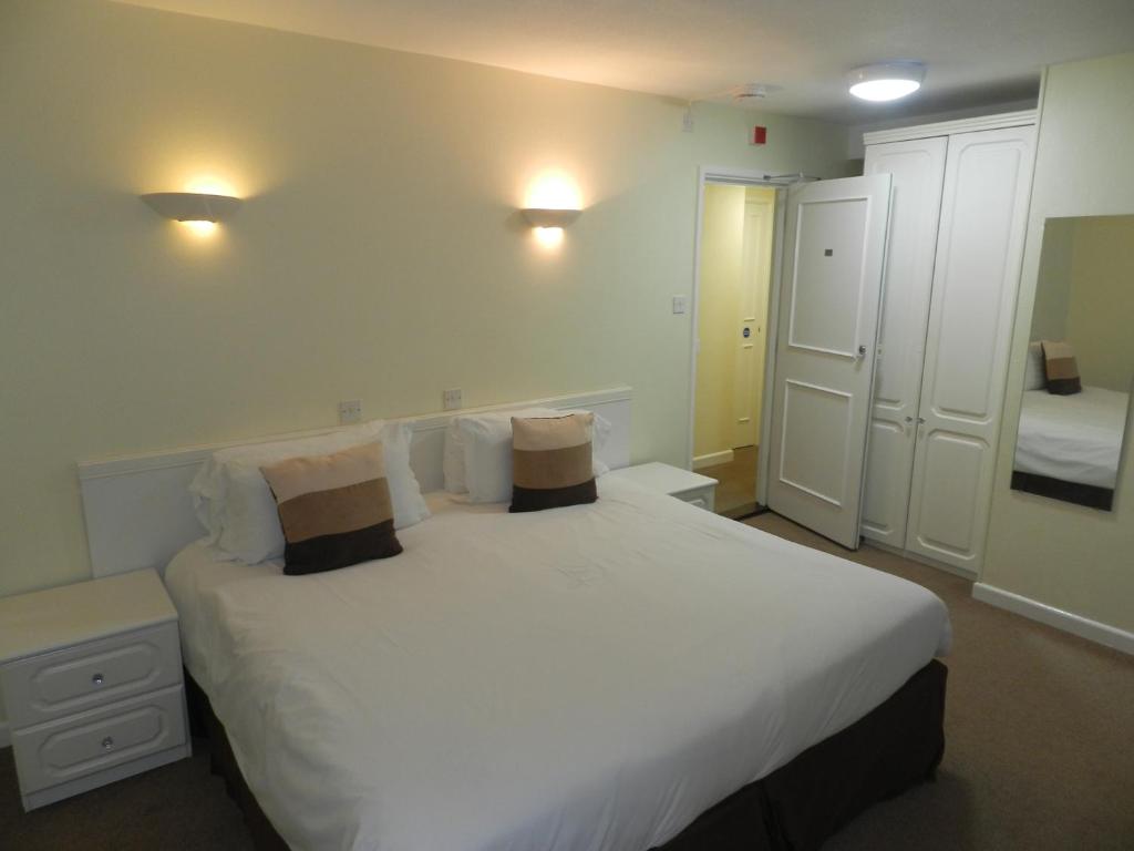 Letto o letti in una camera di Beau Rivage
