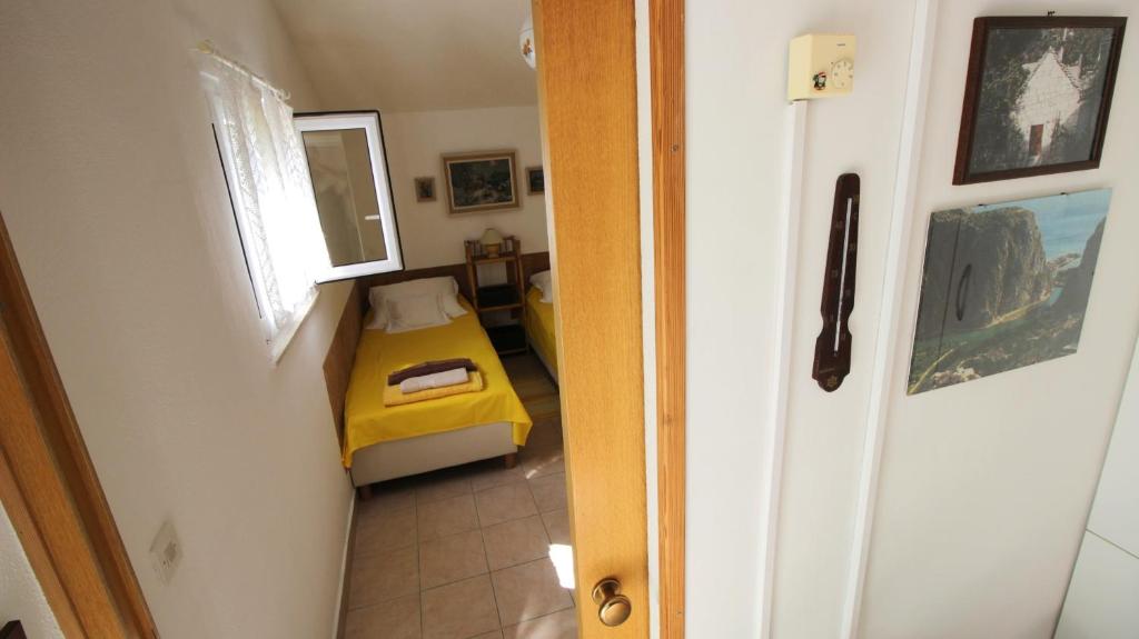 Posteľ alebo postele v izbe v ubytovaní Seaside Apartment
