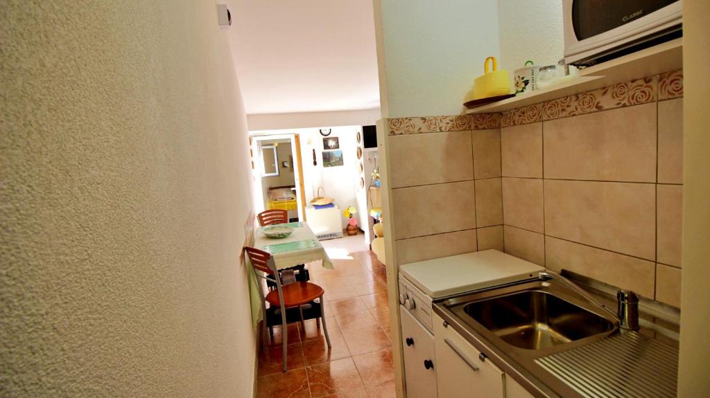 Kuchyňa alebo kuchynka v ubytovaní Seaside Apartment