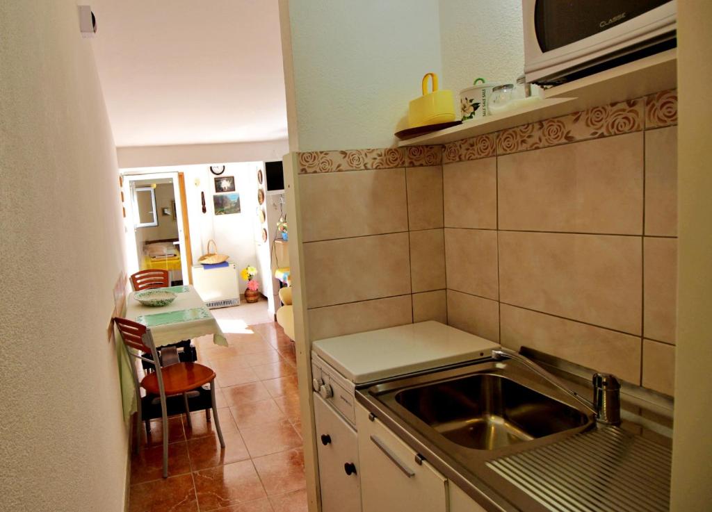 Kuchyňa alebo kuchynka v ubytovaní Seaside Apartment