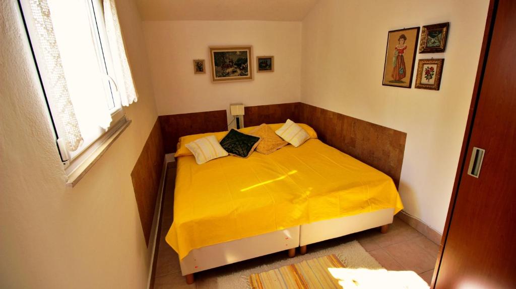 Posteľ alebo postele v izbe v ubytovaní Seaside Apartment