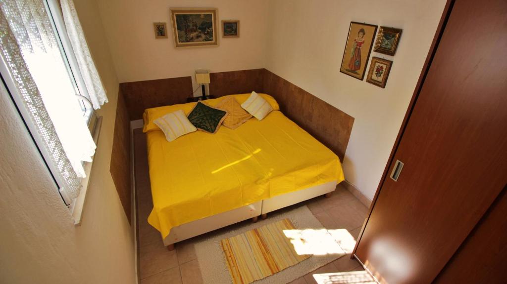 Posteľ alebo postele v izbe v ubytovaní Seaside Apartment