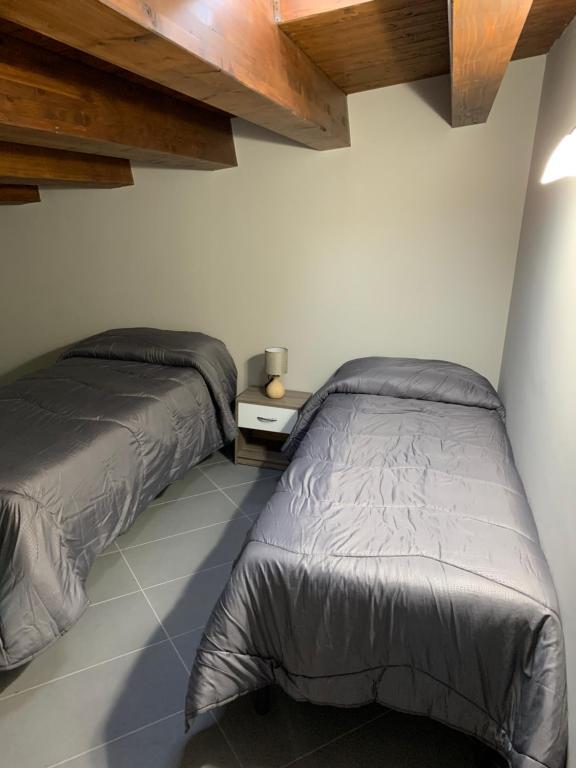 Postel nebo postele na pokoji v ubytování DREAM CORLEONE