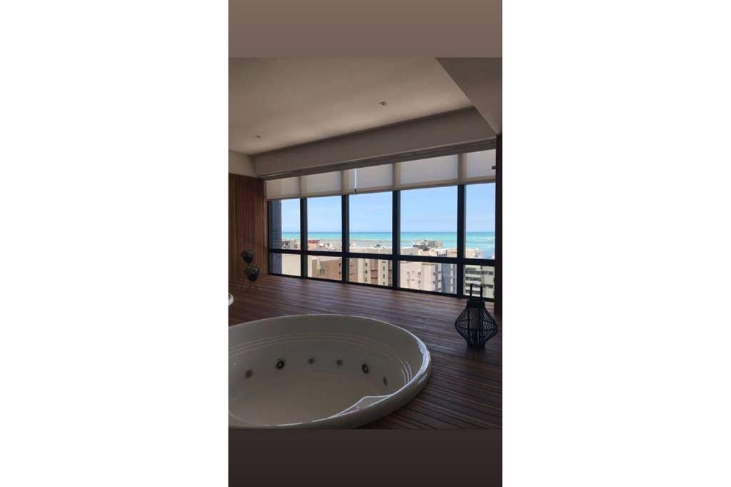  Studio em excelente localização e vista para o mar