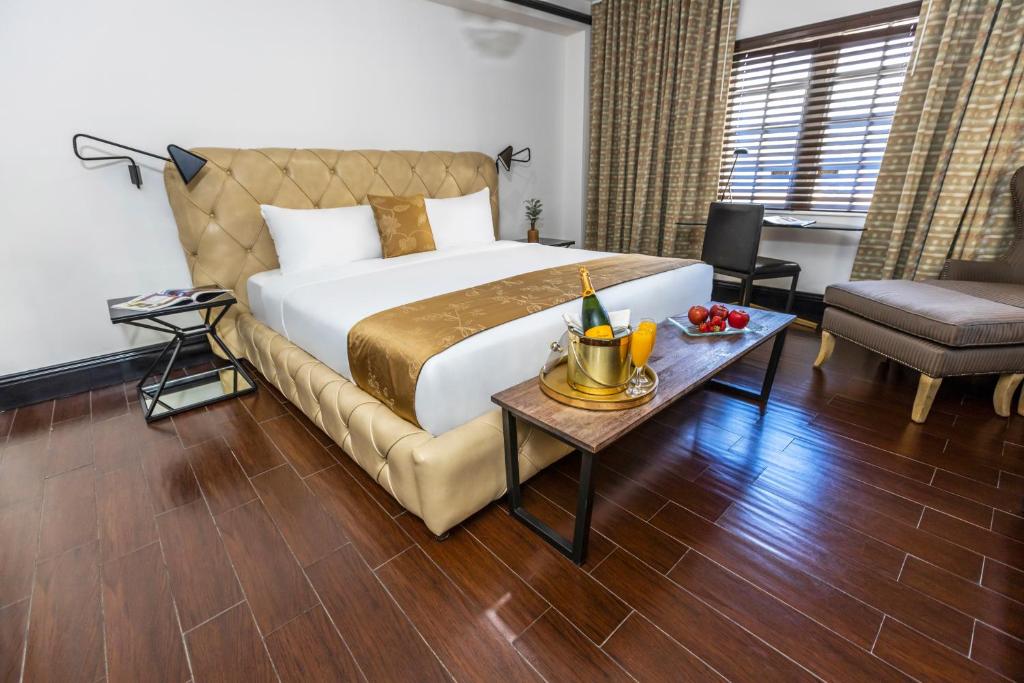 Voodi või voodid majutusasutuse Hotel Croydon toas