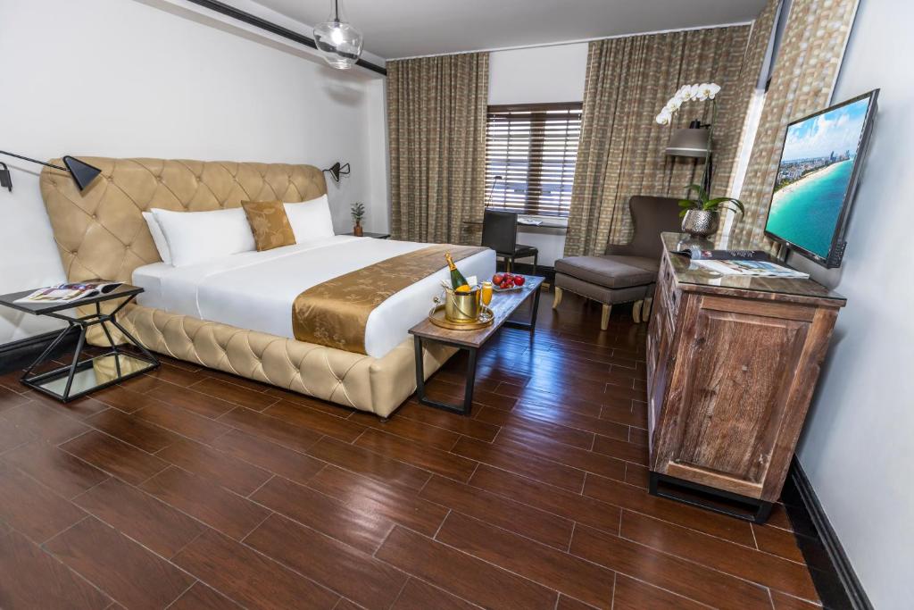 Voodi või voodid majutusasutuse Hotel Croydon toas
