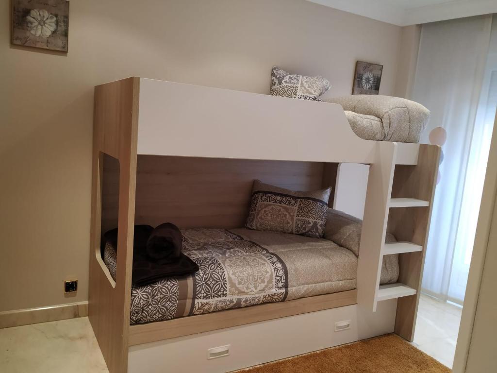 Posteľ alebo postele v izbe v ubytovaní El olivo