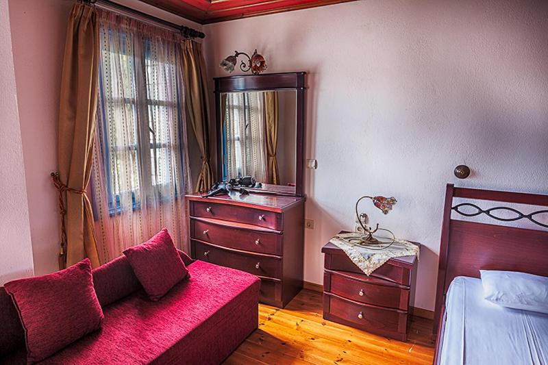 Postel nebo postele na pokoji v ubytování Hotel Ladias