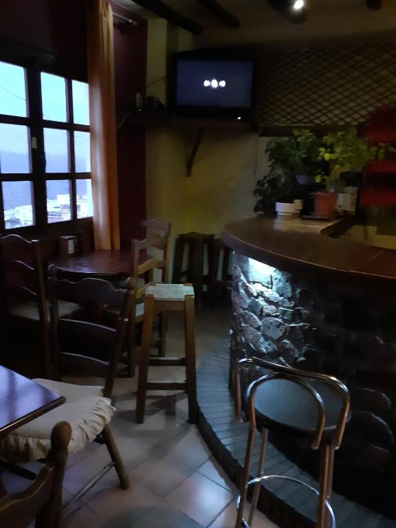 TV a/nebo společenská místnost v ubytování El Tinao