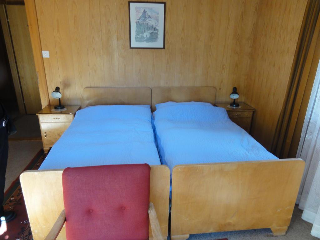 Postel nebo postele na pokoji v ubytování Hotel Cima