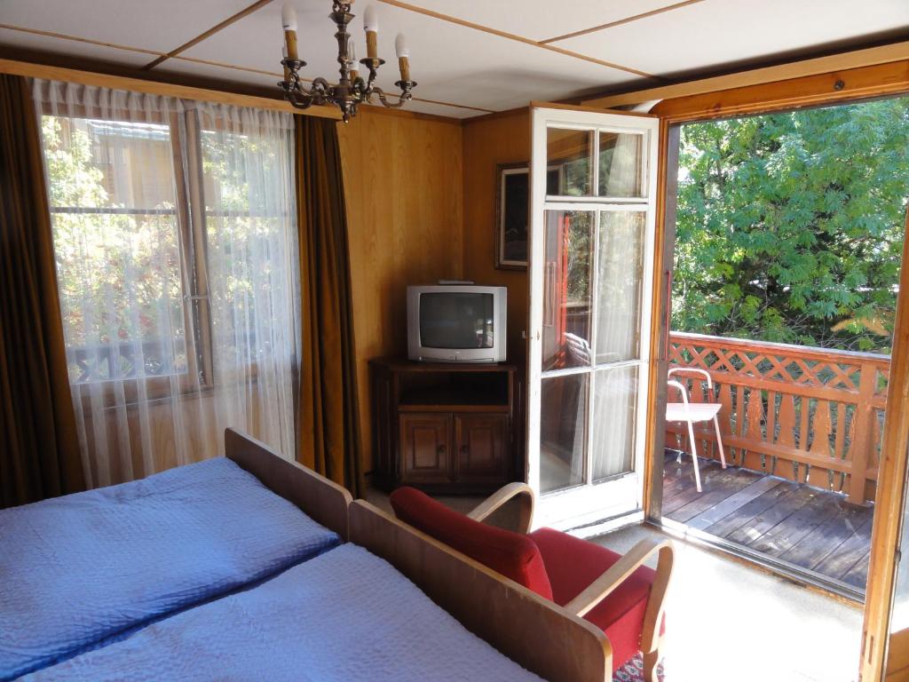 TV a/nebo společenská místnost v ubytování Hotel Cima