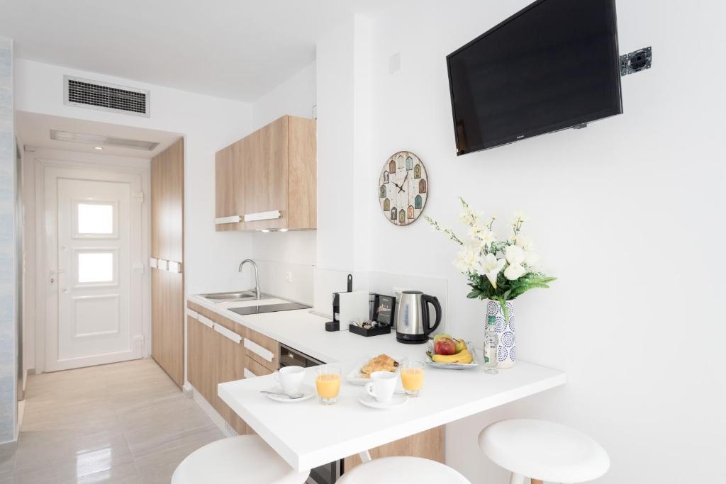 Kuchyň nebo kuchyňský kout v ubytování Hotel Defkalion