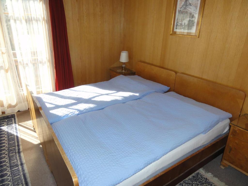 Postel nebo postele na pokoji v ubytování Hotel Cima