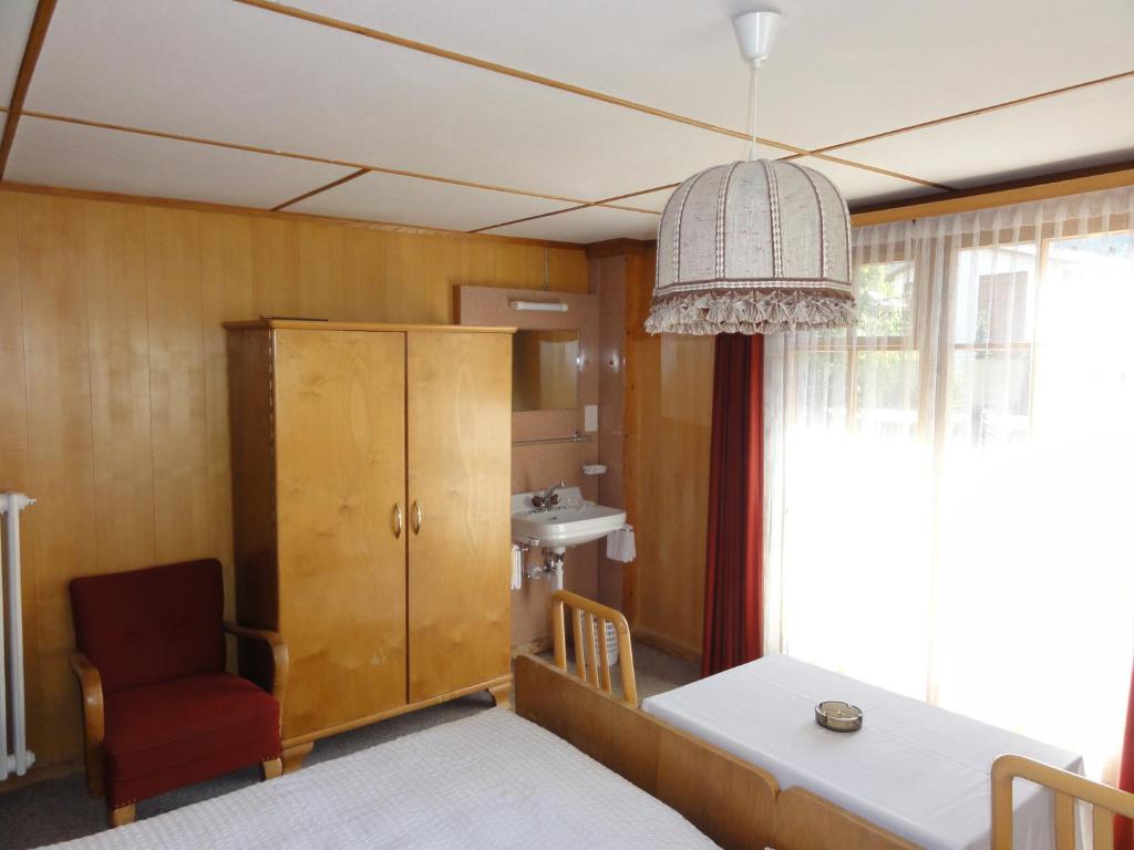 Postel nebo postele na pokoji v ubytování Hotel Cima