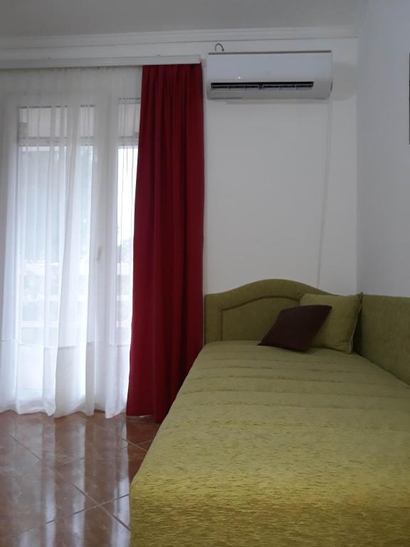 Postel nebo postele na pokoji v ubytování Apartments Jovanic with 2 bedrooms