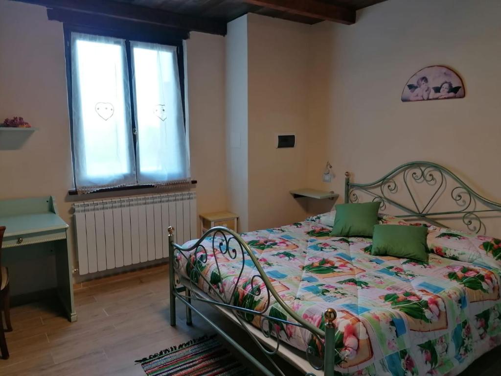 Postel nebo postele na pokoji v ubytování Il Castagneto