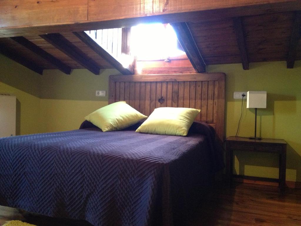 Cama o camas de una habitación en Casa Rural Frutos