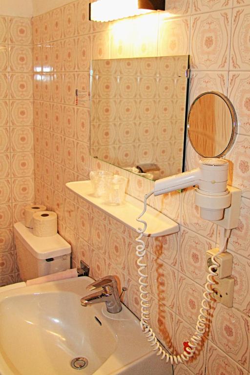 Kúpeľňa v ubytovaní Hotel Post