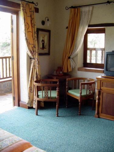 TV a/nebo společenská místnost v ubytování The Mill Hotel