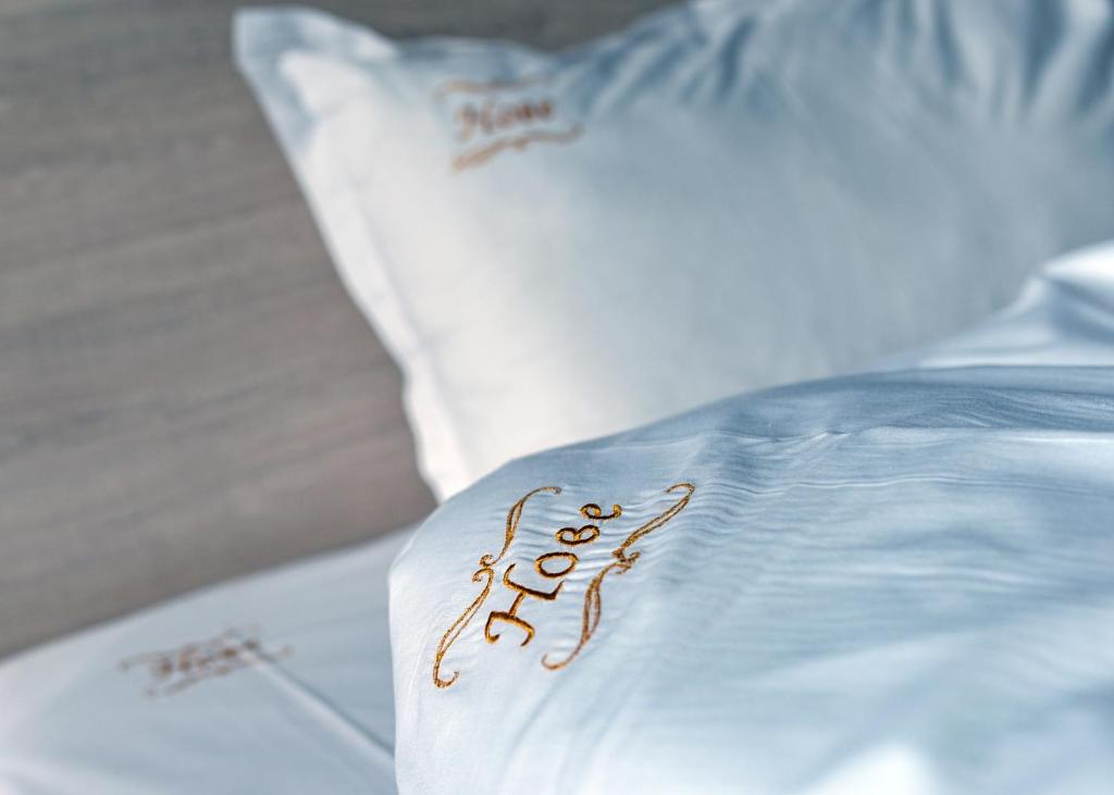 Postel nebo postele na pokoji v ubytování Hotel Nove