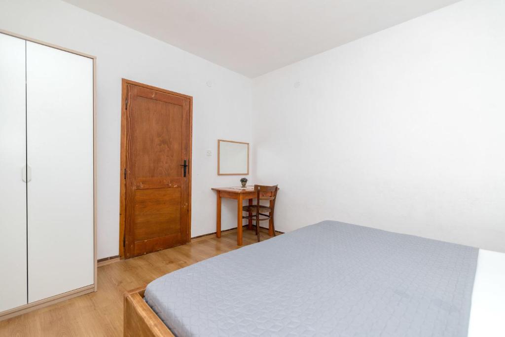 Posteľ alebo postele v izbe v ubytovaní Apartment Robinzon Lantana