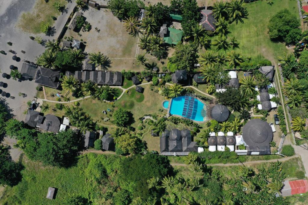 an overhead view of an estate with a swimming pool at White Chocolate Hills Resort in Zamboanguita