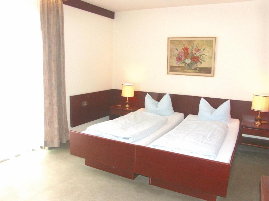 Postel nebo postele na pokoji v ubytování Hotel Park Eden