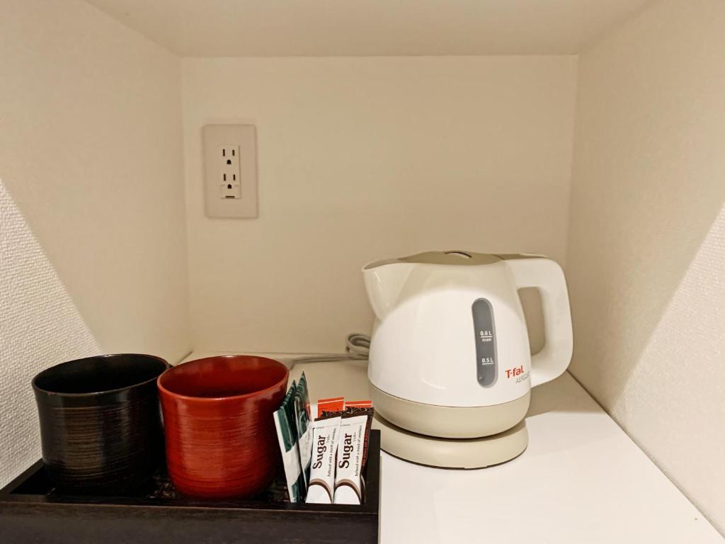 Příslušenství pro přípravu čaje a kávy v ubytování Carta Hotel Kyoto Bettei