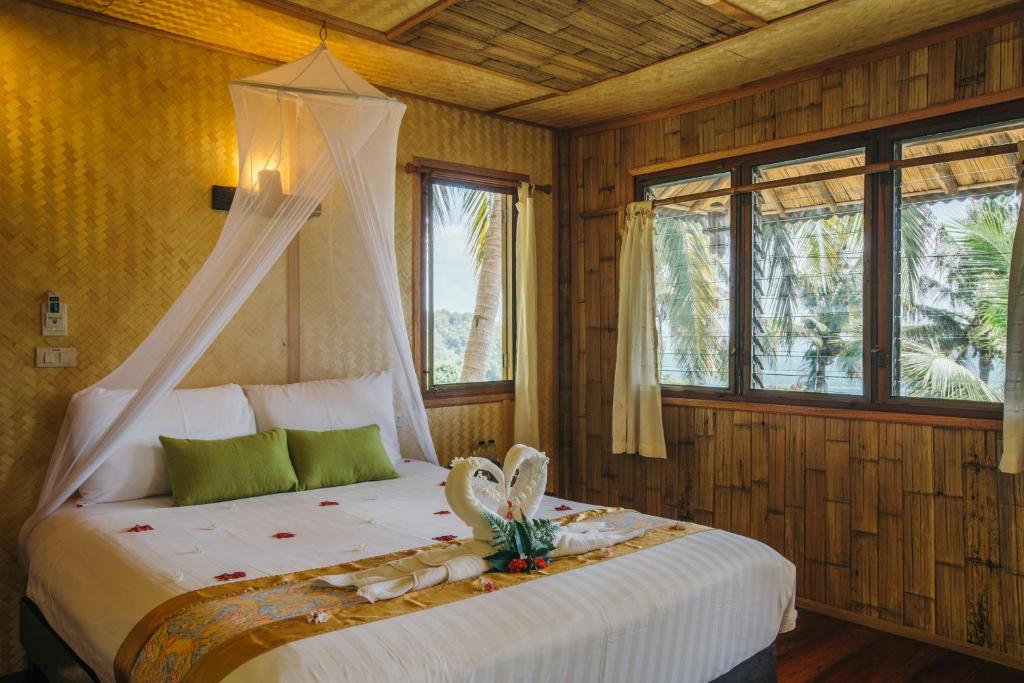 En eller flere senge i et værelse på Railay Garden View Resort